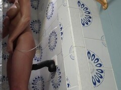AMATEUR WIFE HAS ORGASMIC SHOWER WITH THICK BLACK DILDO 2 cam view Thumb