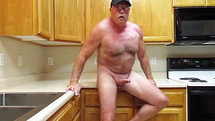 Naked on the kitchen counter. Thumb